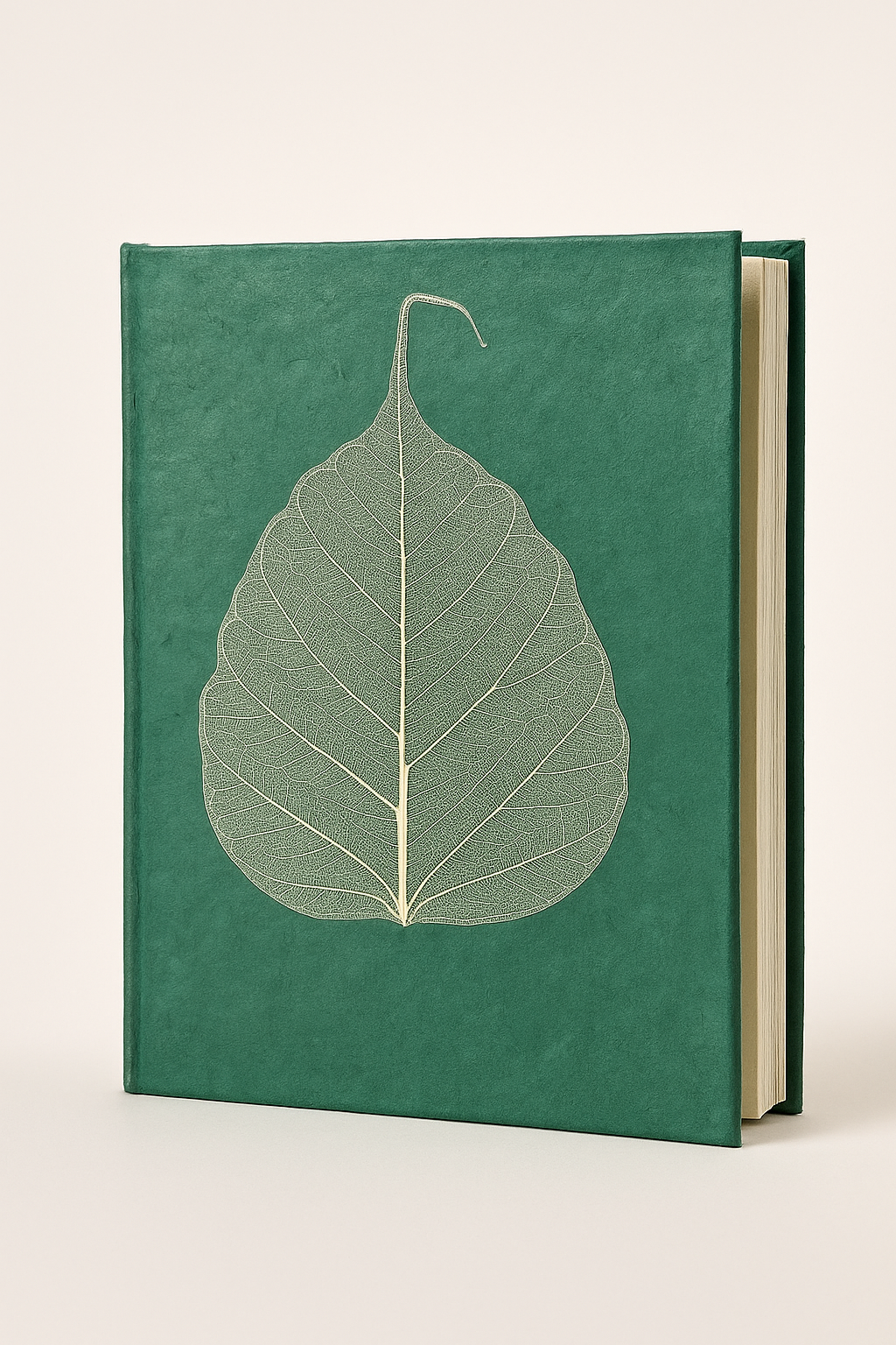 Handmade green Lokta notebook with real Bodhi leaf design, crafted from tree-free Nepali paper.