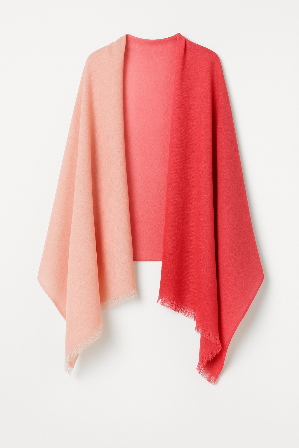 Shaded pink pashmina stole draped on a hanger, transitioning from soft blush to coral red with delicate fringe edges, displayed on a white background – handwoven in Nepal.