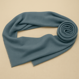 "Stone blue pashmina scarf in soft wool blend, handwoven in Nepal"